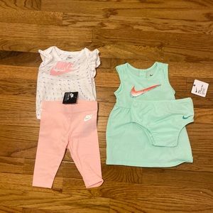 Two brand new with tag Nike outfits